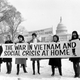 Members of a women’s brigade hold a banner protesting the Vietnam War at a march led by former Montana congresswoman Jeannette Rankin in Washington, D.C. on Jan. 15, 1968. Behind them are other protesters and the U.S. Capitol building. Carrying the sign, from left, are: Ruth Krause, Mrs. Vel Phillips, Wenn Griffin, Ruth Warwick, and Lucy Montgomery. Photo via AP Images.